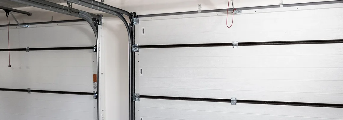 Fix Folding Garage Door Jerking in Homestead, Florida