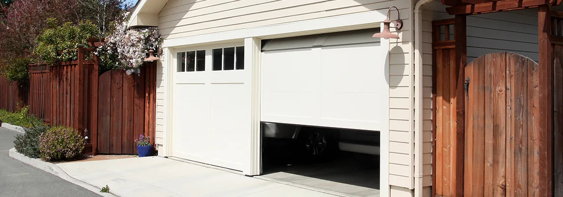 Fix Metal Garage Door Jerking in Homestead, Florida